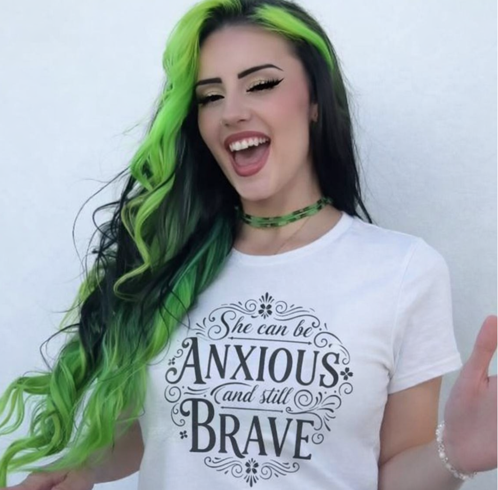 Young girl wearing the I'm anxious - mental health awareness shirt